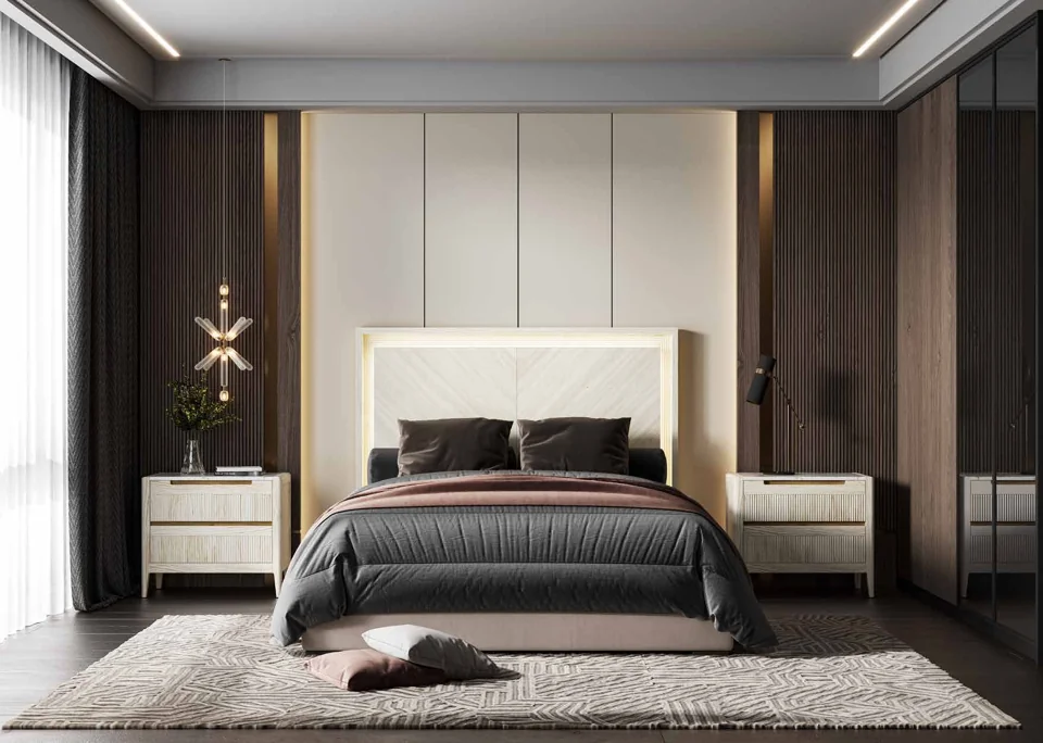Catalogue bedroom with a pale headboard and two bedside tables against a dark wall