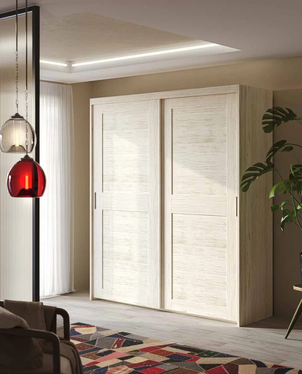 Pale bedroom wardrobe with sliding doors