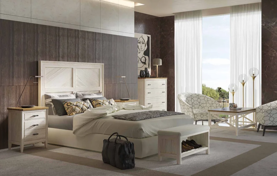 Pale bedroom with a bed, bedside tables, chest of drawers and end-of-bed bench